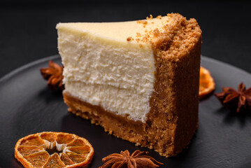 Delicious sweet cheesecake cake on textured concrete background