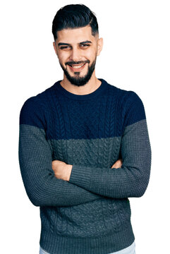 Young arab man with beard with arms crossed gesture smiling and laughing hard out loud because funny crazy joke.