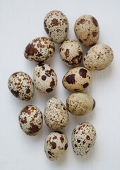 Fototapeta premium quail eggs on white background