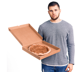 Young handsome man holding delivery italian pizza thinking attitude and sober expression looking self confident