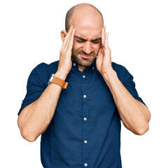 Young hispanic man wearing casual clothes with hand on head, headache because stress. suffering...