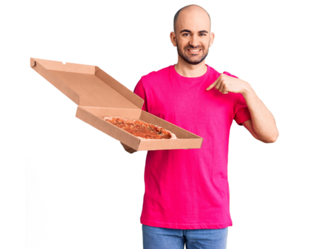 Young handsome man holding delivery pizza cardboard box pointing finger to one self smiling happy and proud