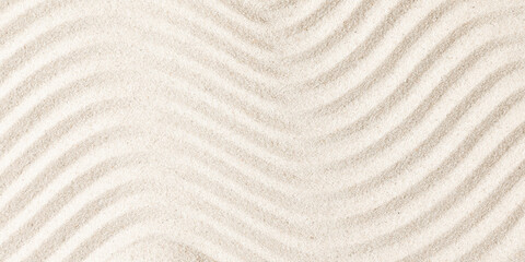 Sand pattern as background. Zen pattern in white sand. Beach sand texture in summer sun.