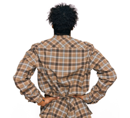 Young african american man with beard wearing casual clothes and glasses standing backwards looking away with arms on body