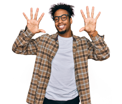 Young african american man with beard wearing casual clothes and glasses showing and pointing up with fingers number ten while smiling confident and happy.