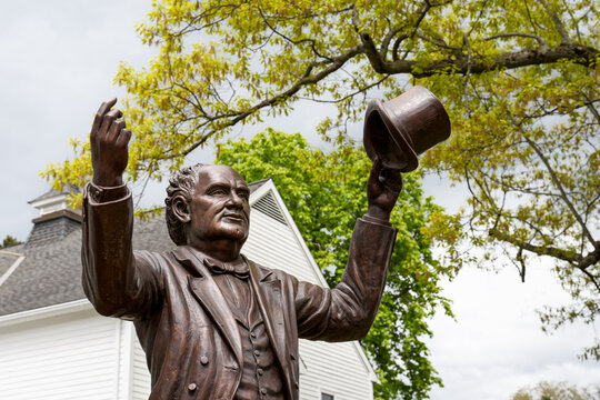Bethel, CT - May 3, 2023: This statue of Phineas Taylor (P.T.) Barnum, by sculptor David Gesualdi, stands in front of the library. Barnum was born in Bethel, Connecticut.