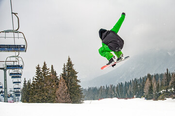 Snowboarder on a slope in the alps