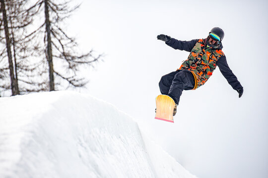 Snowboarder on a slope in the alps