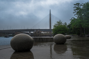 A bridge over the Charles river in the rain, Boston, MA © Jay