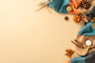 Experience allure of autumn: top view capturing snug plaid, petite pumpkins, yellow maple leaves,...