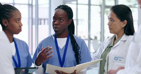 Teamwork, meeting and group of doctors in a hospital working on medical plan. Discussion, diversity and team of professional healthcare workers in collaboration talking about consultation in clinic. - Powered by Adobe