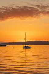 beautiful sunset at the sea with boats