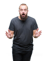 Young caucasian hipster man over isolated background afraid and shocked with surprise expression, fear and excited face.