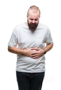 Young caucasian hipster man wearing casual t-shirt over isolated background with hand on stomach because indigestion, painful illness feeling unwell. Ache concept.