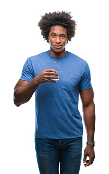 Afro american man drinking glass of water over isolated background with a confident expression on smart face thinking serious