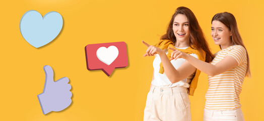 Young gossiping women and social network reactions on yellow background