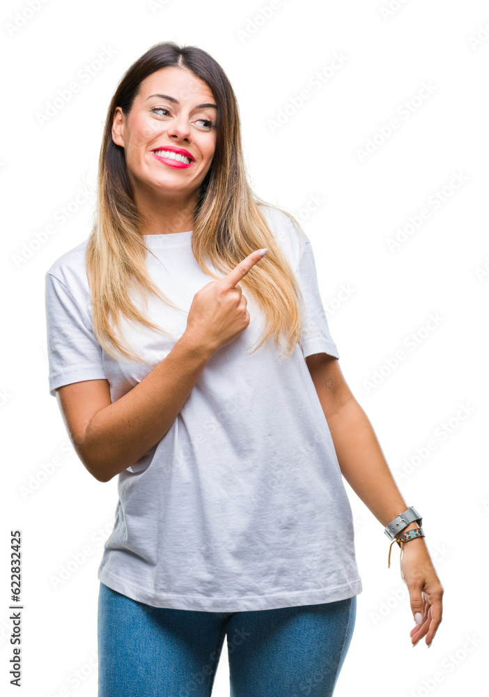 Canvas Prints Young beautiful woman casual white t-shirt over isolated background cheerful with a smile of face pointing with hand and finger up to the side with happy and natural expression on face