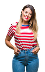Fototapeta premium Young beautiful woman casual look over isolated background with a happy and cool smile on face. Lucky person.