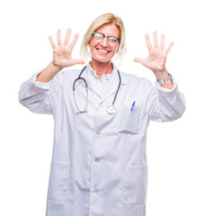 Middle age blonde doctor woman over isolated background showing and pointing up with fingers number ten while smiling confident and happy.