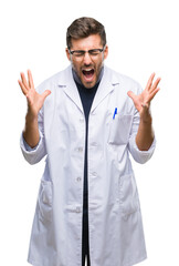 Young handsome man wearing doctor, scientis coat over isolated background celebrating mad and crazy...