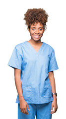 Young african american doctor woman over isolated background with a happy and cool smile on face....