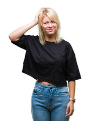 Fototapeta premium Young beautiful blonde woman over isolated background confuse and wonder about question. Uncertain with doubt, thinking with hand on head. Pensive concept.