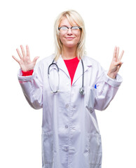 Young beautiful blonde doctor woman wearing medical uniform over isolated background showing and pointing up with fingers number eight while smiling confident and happy.