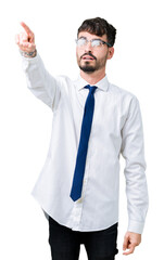 Young handsome business man wearing glasses over isolated background Pointing with finger surprised ahead, open mouth amazed expression, something in front