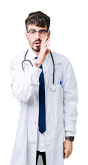 Young doctor man wearing hospital coat over isolated background hand on mouth telling secret rumor, whispering malicious talk conversation