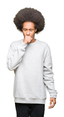 Young african american man with afro hair wearing sporty sweatshirt feeling unwell and coughing as symptom for cold or bronchitis. Healthcare concept.