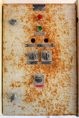 close up on an old and rusty main power board 
