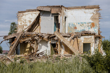 Destroyed private building. Consequences of the disaster.