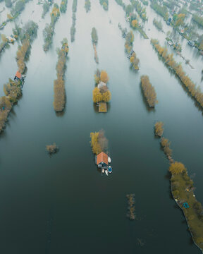 Aerial view of houses on the water, Scheendijk, Netherlands.