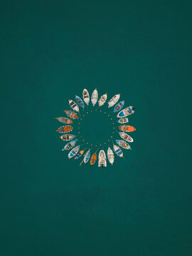 Aerial view of boats in a circle, Cinque Terre, Italy.
