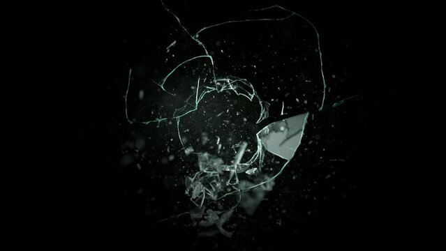 Super Slow Motion Shot of Real Bullet Glass Break Isolated on Black Background at 1000fps.