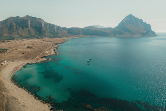 Panoramic aerial view of Macari beach and Mount Cofano, Sicily, Italy.
