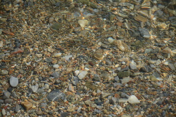 Beautiful sea stones in the coastal area of ​​the beach