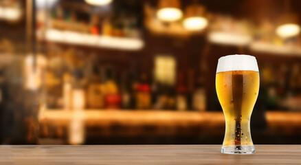 beer served in a glass in a bar
