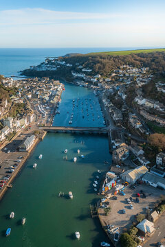 Aerial view of Looe, Looe River and iconic bridge, Cornwall, United Kingdom.