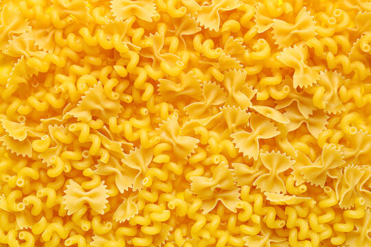 Raw farfale and cavatappi pasta as background, closeup