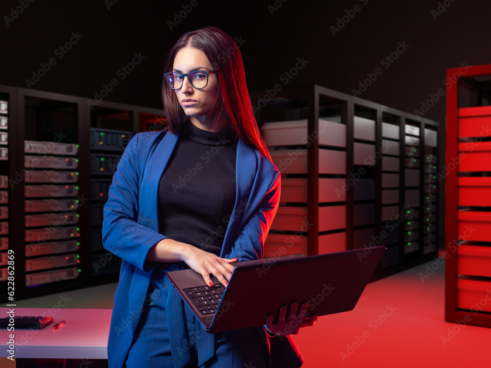 Poster businesswoman in server room. woman with laptop. data center manager. girl administrator hosting pro