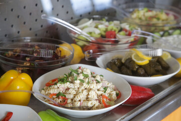 Various food served on a buffet line	