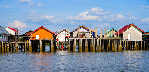 Houses on stilts in the floating fishing village of Koh Panyee, suspended over the waters of the Andaman Sea in the Phang Nga Bay, Thailand © Alexandre ROSA