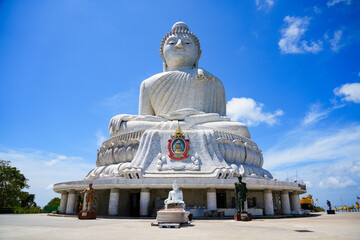 Fototapeta premium The Great Buddha of Phuket aka Ming Mongkol Buddha, is a seated Maravijaya Buddha statue made of concrete and covered in white Burmese marble tiles. It sits on top of a hill on Phuket island, Thailand