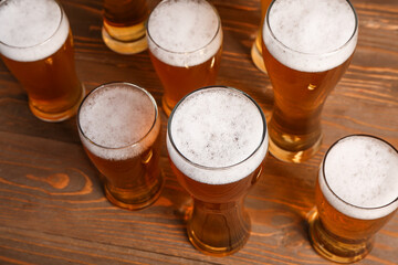 Glasses of cold beer on wooden background. Oktoberfest celebration