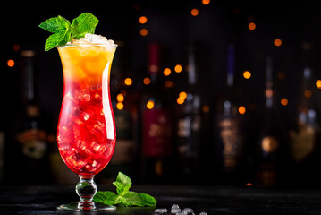 Aruba Ariba alcoholic cocktail drink with vodka, white rum, orange, lemon and pineapple juice,...