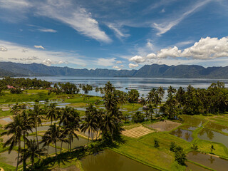 Rice fields and farmland in the highlands next to the lake Maninjau. Sumatra, Indonesia.