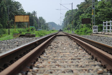 A beautiful landscape photo of bike crossing on the railway rail at beautiful place.
