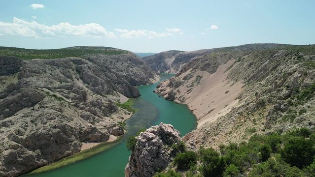 Gree river flows in arid landscape, Croatia from above