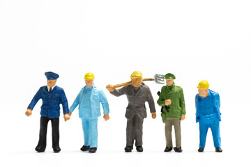 Miniature people different professions standing on white background , Labour day concept